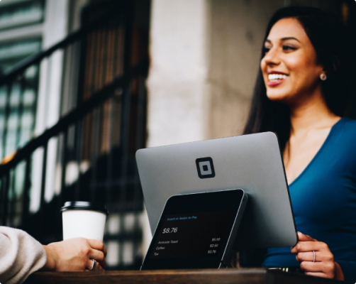 a woman with her laptop talking about business